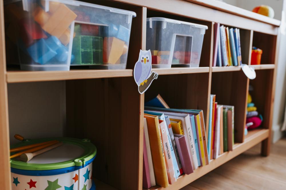 Shelves of toys and books in a nursery school